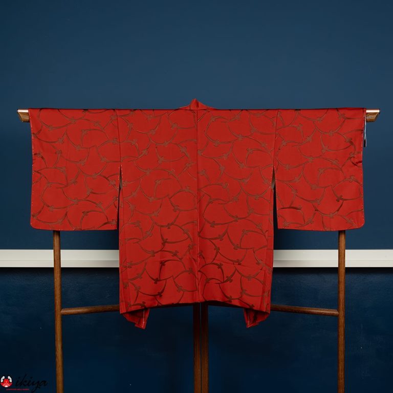 Haori da donna in seta arancio mattone con motivo tradizionale