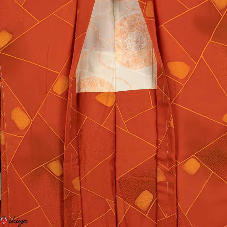 Haori da donna in seta arancione con motivo geometrico