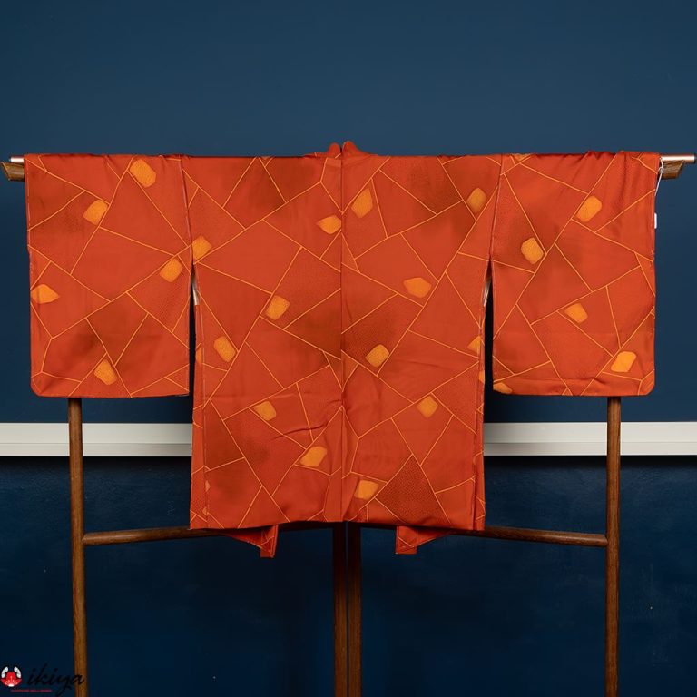 Haori da donna in seta arancione con motivo geometrico