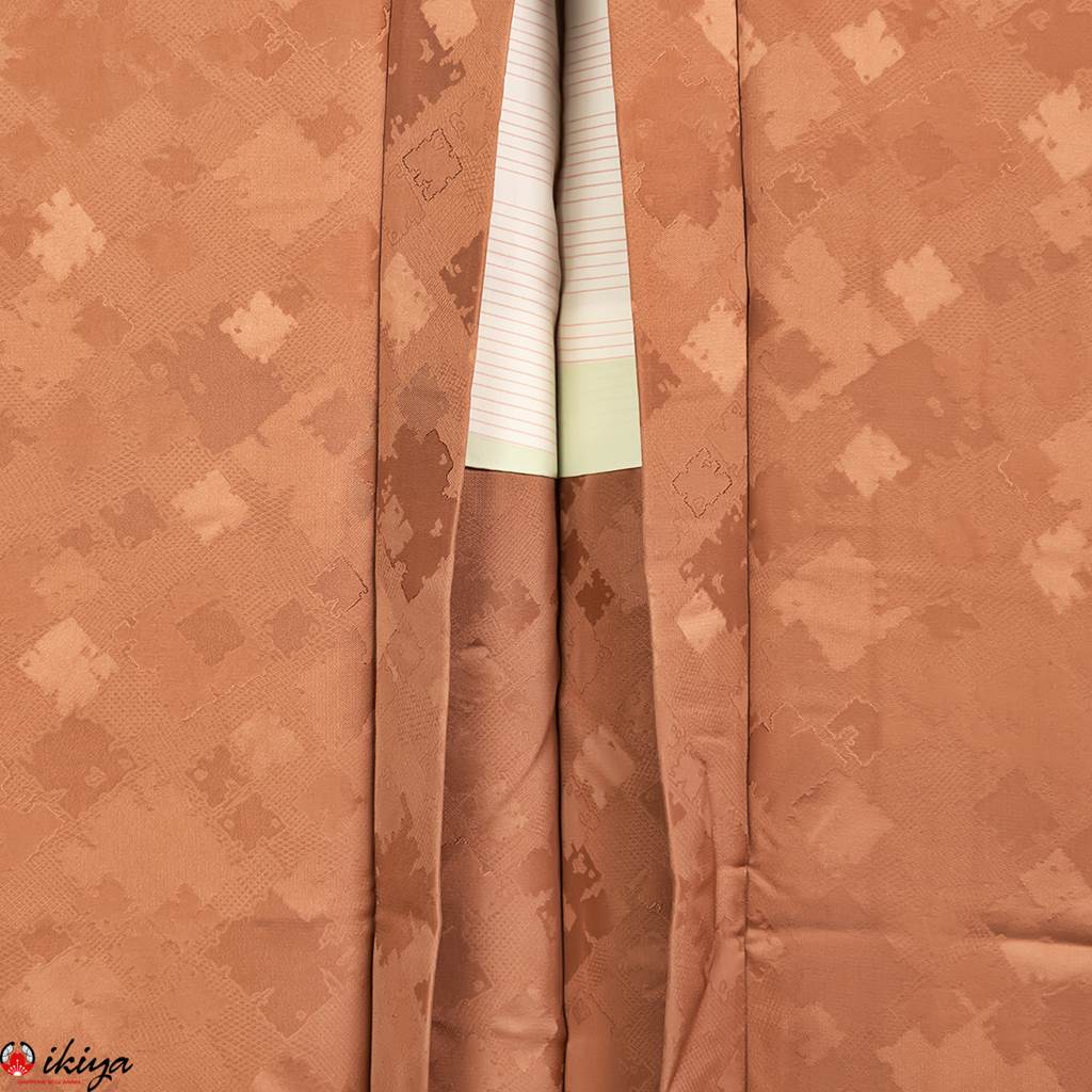 Haori da donna in seta "rinzu" rosa antico con motivo geometrico