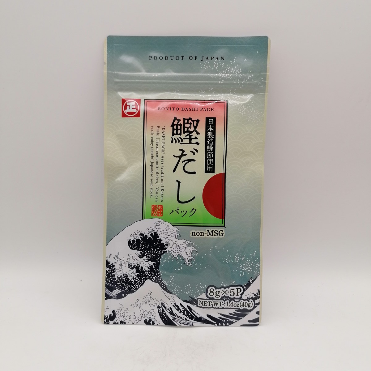 Package of Bonito Dashi Pack Shinmarusho 8g x 5, with Japanese wave design and text in Japanese and English.