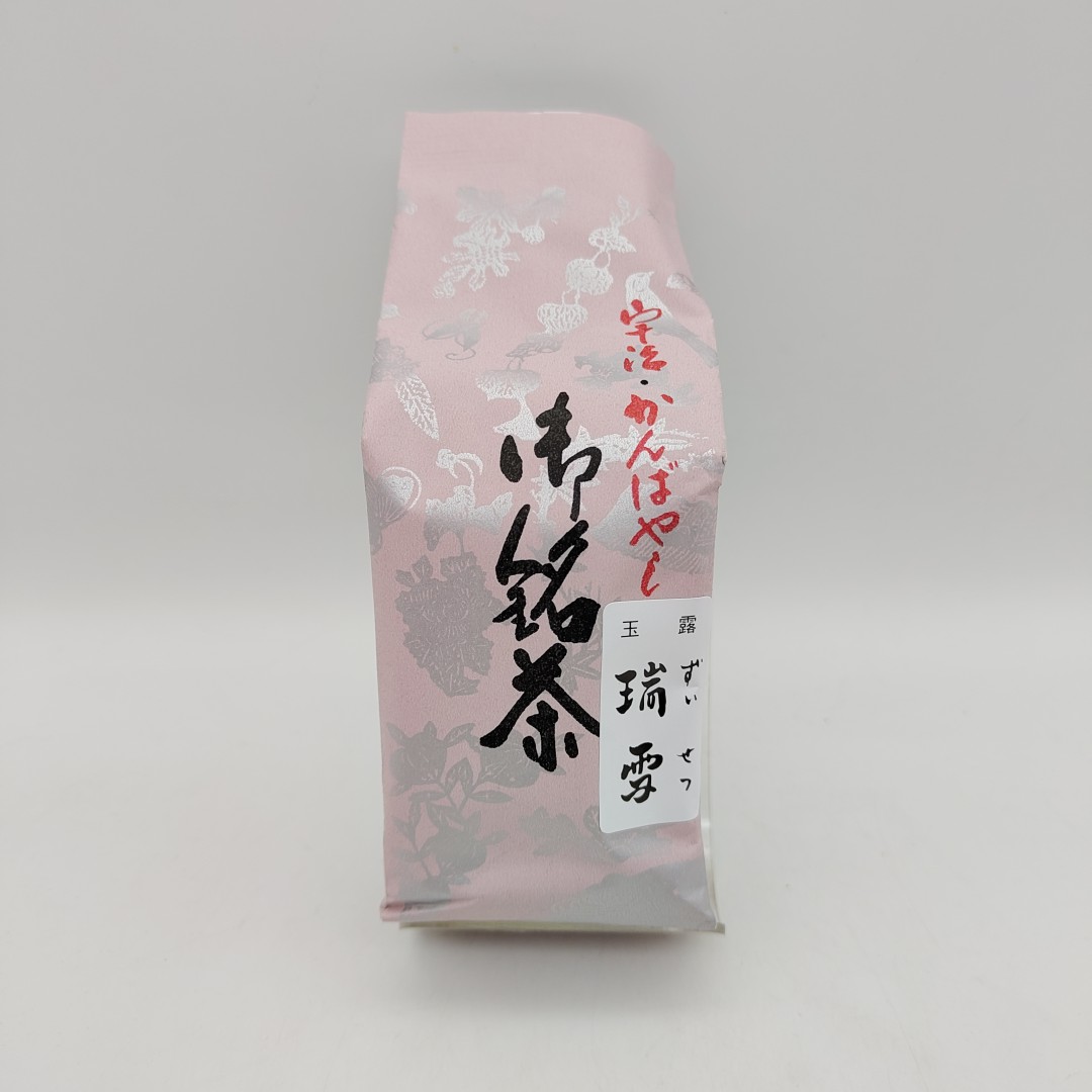 Confezione rosa con motivi floreali argentati e scritte giapponesi per il tè Gyokuro Zuimei di Ocha no Kanbayashi.